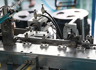 Automatic connector assembly equipment pictured on the CZT website